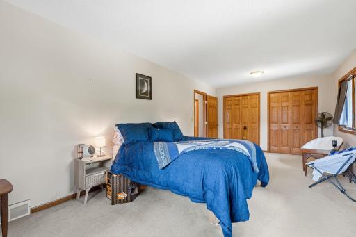 Primary bedroom with two walk in closets.