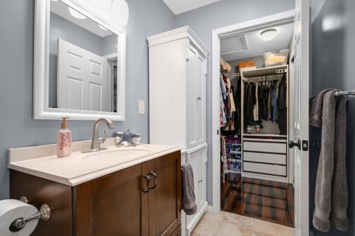 View of primary closet from the bathroom..