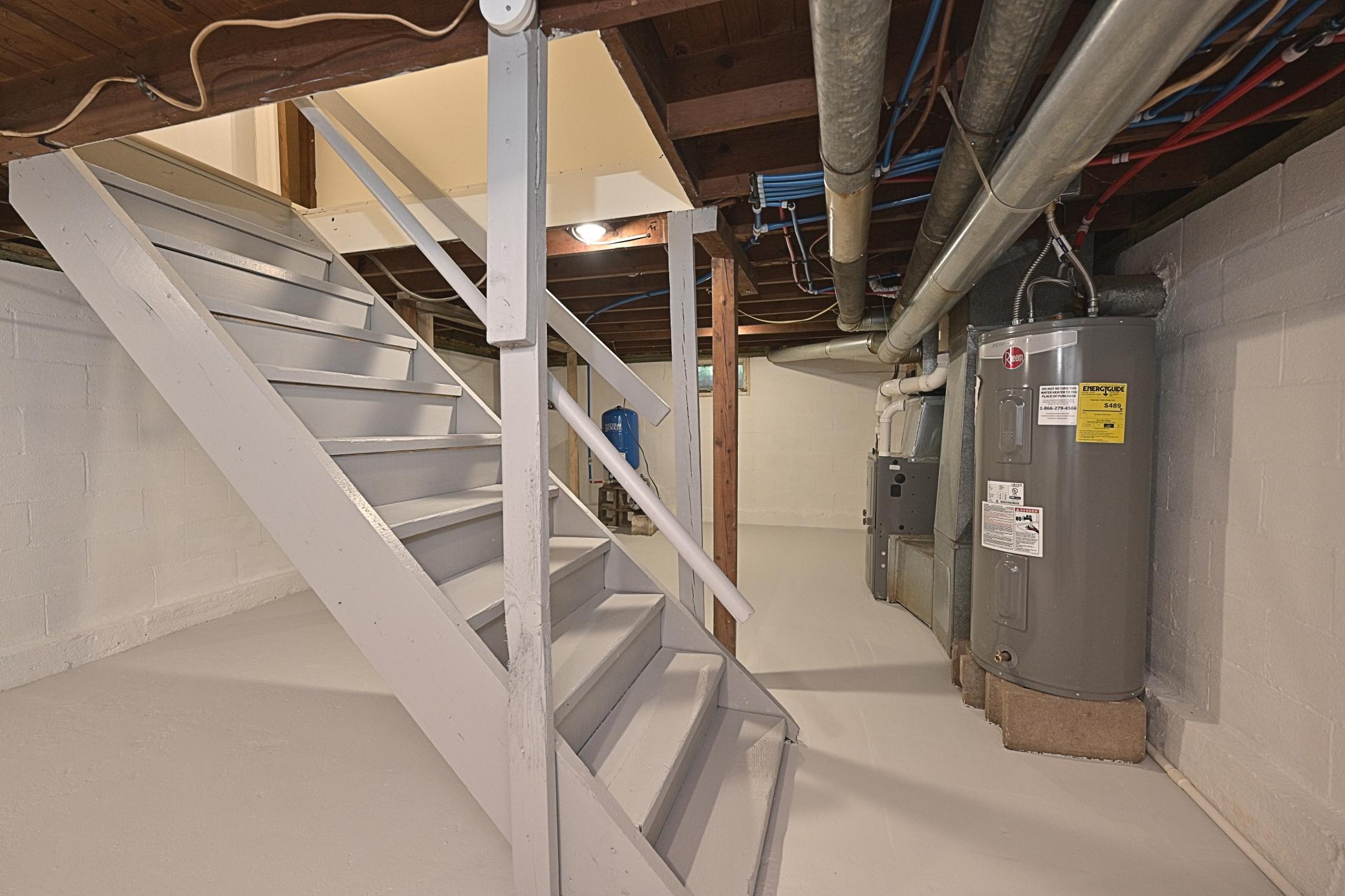 STAIRS TO LOWER LEVEL AND UTILITIES.jpg