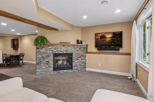 You'll also find the second gas fireplace with tiled surround in the lower level.