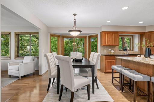 The informal dining space can accomodate a large table and connects wonderfully to the other rooms in the home making entertaining a breeze.
