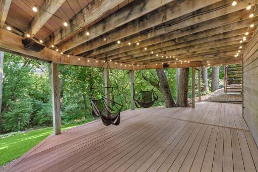 The home has two maintenance free decks! What a great place to hang out and take in the backyard. The two hanging hammocks are staying with the home.