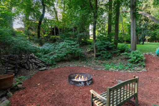 Plus, a fun private bonfire area in the back of the yard tucked away in the trees!