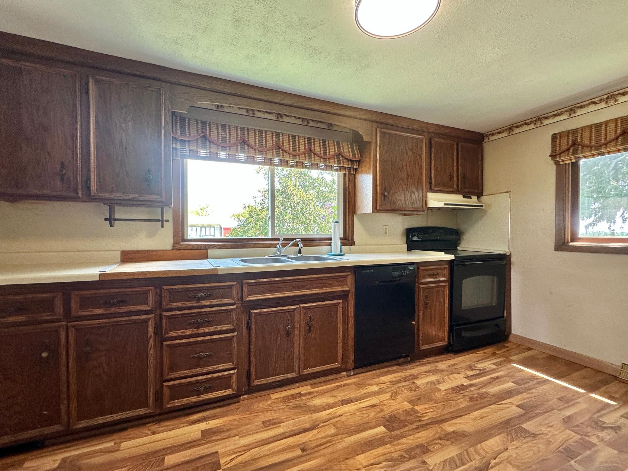 The kitchen windows gather lots of natural light.