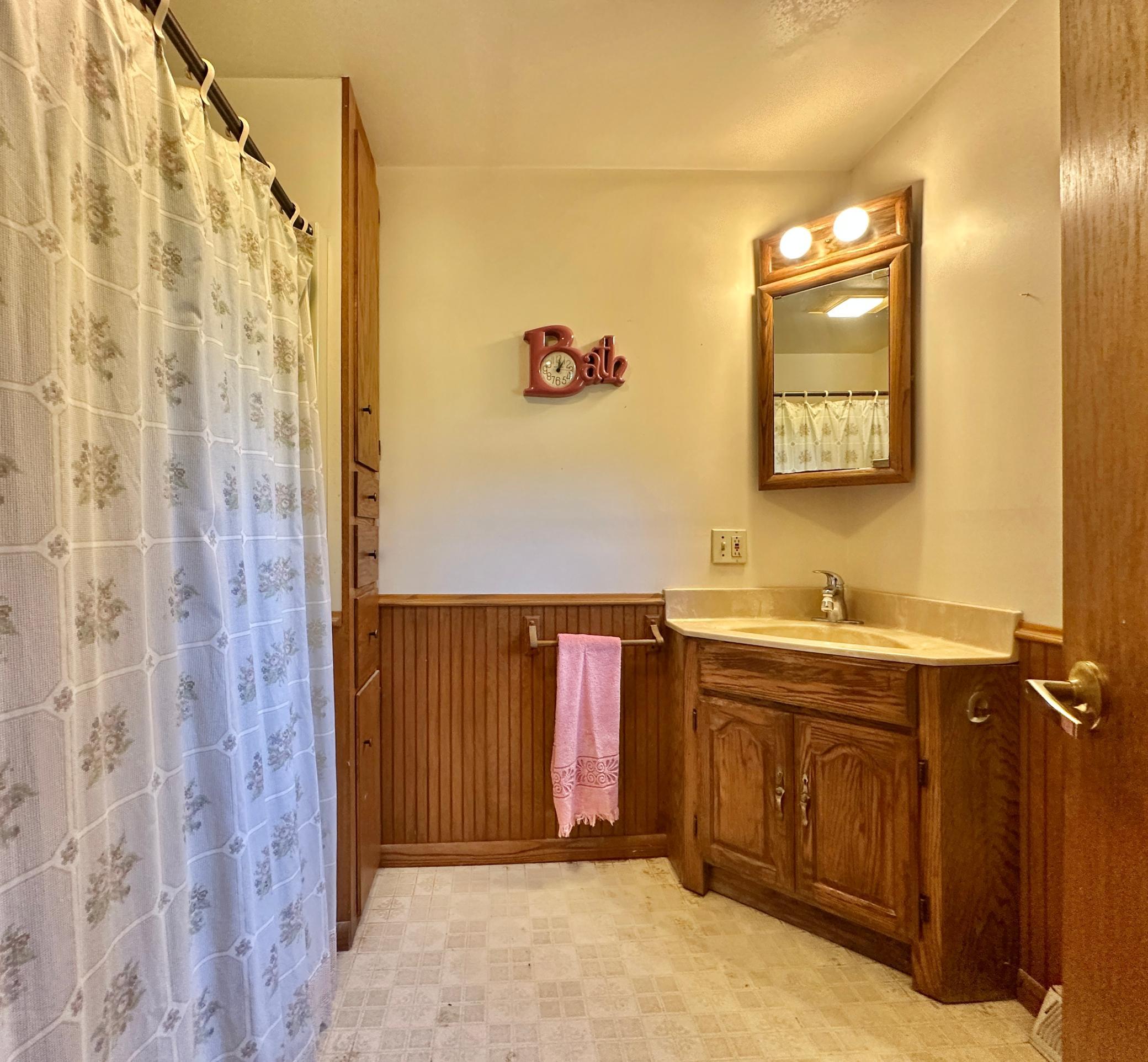 You will enjoy the main level full bath for its roominess.