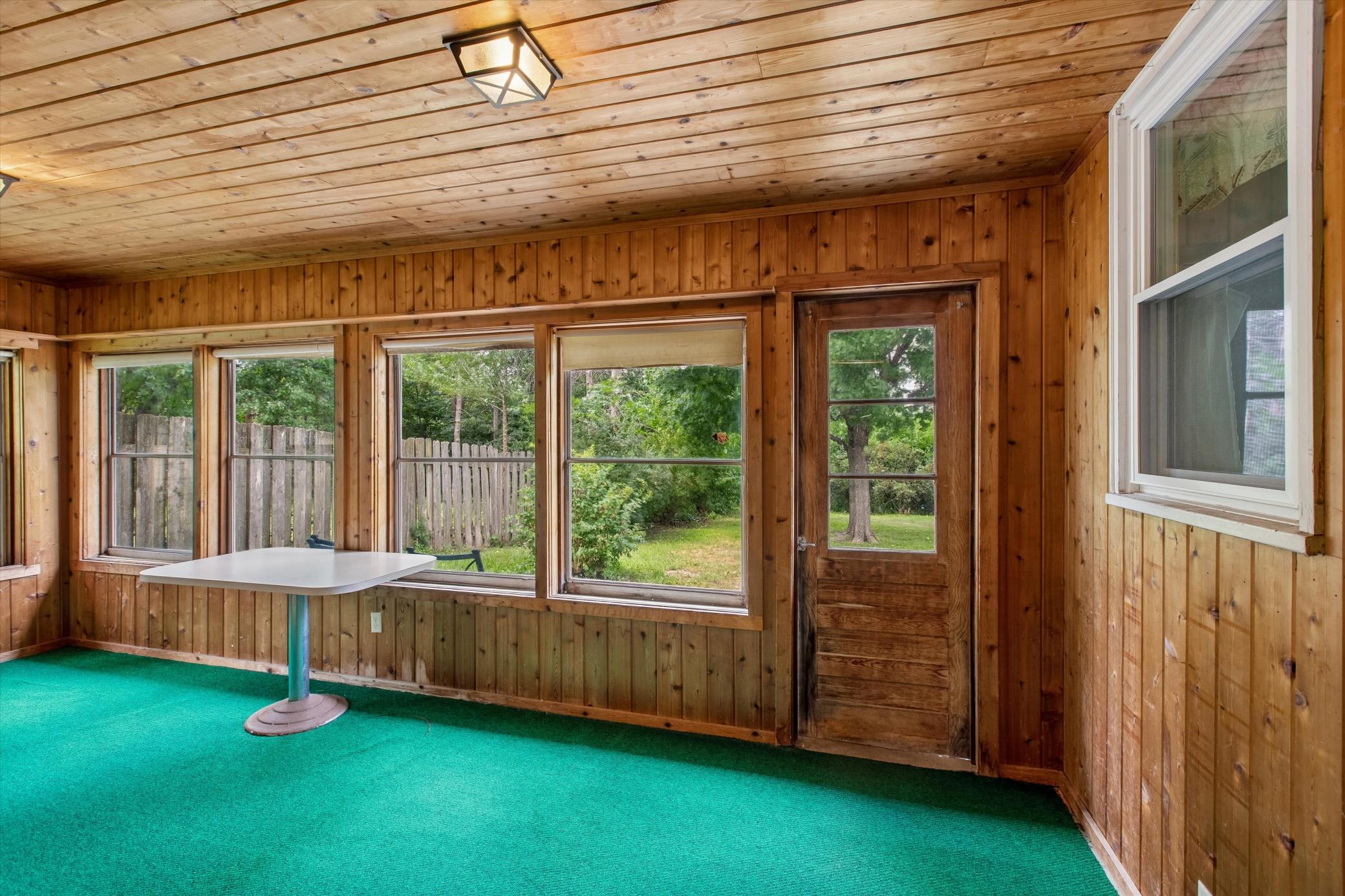 Enclosed porch with backyard access