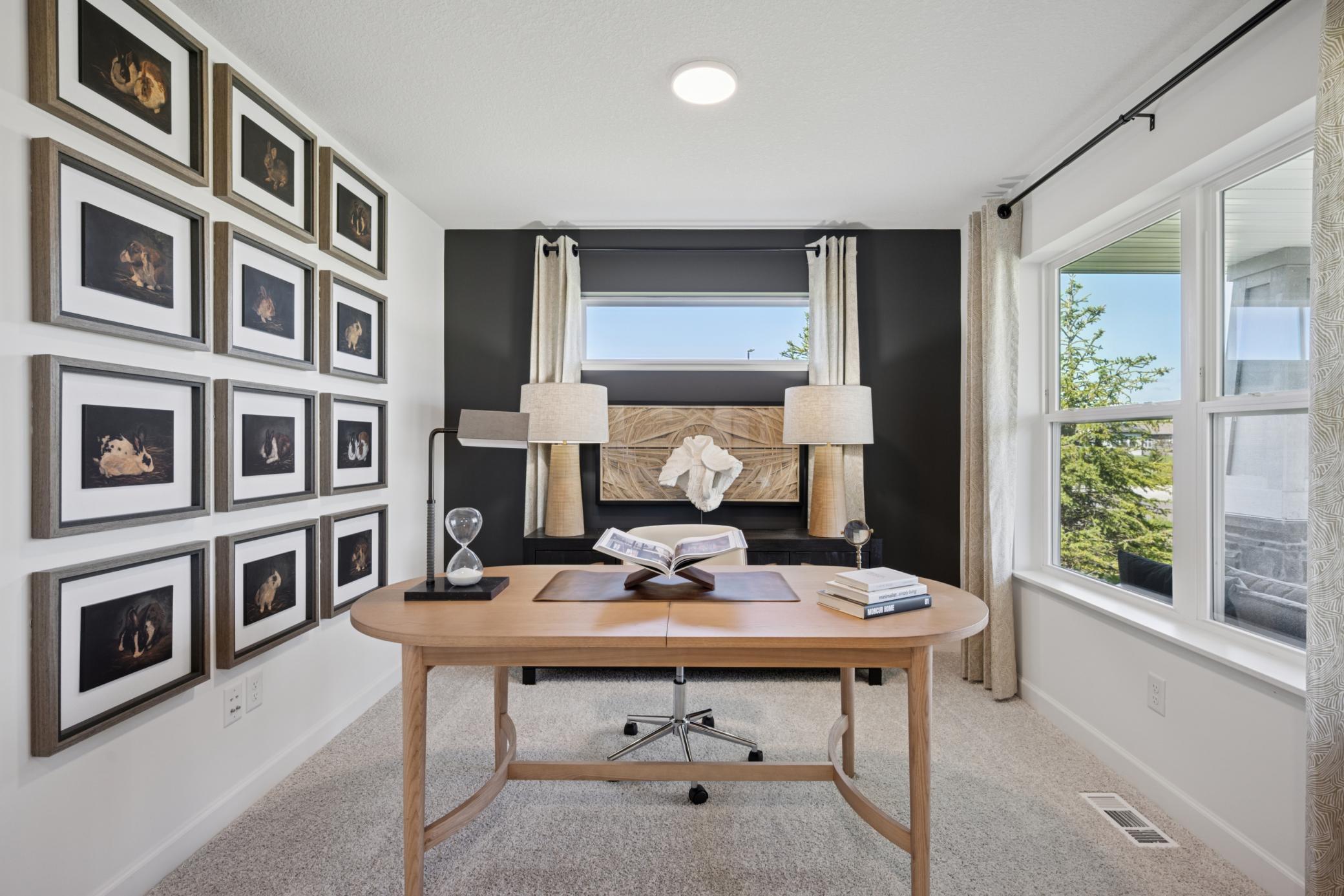 *Photo of model home, actual features may vary. Located just off the foyer, this main-level flex room provides endless opportunities, including a home office, formal dining area, an extra playroom, or another sitting room.