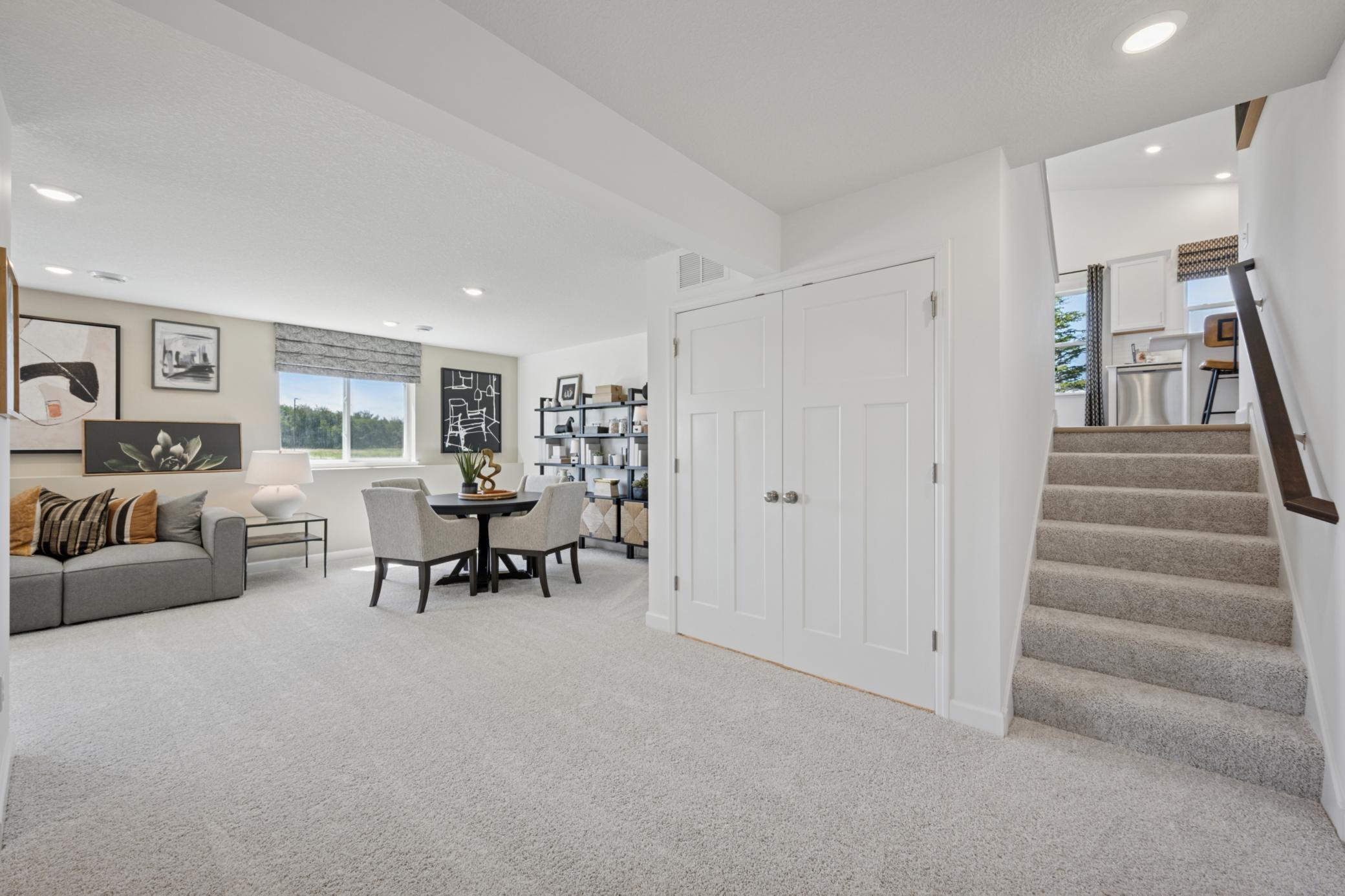 *Photo of model home, actual features may vary. The stairs lead to the finished lower level.