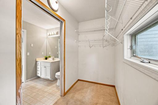 spacious walk in closet just off the bathroom