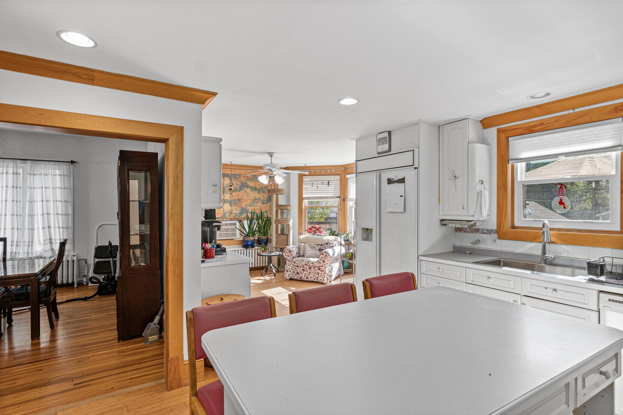Kitchen Leads to Formal Dining Room & Opens to Sunroom