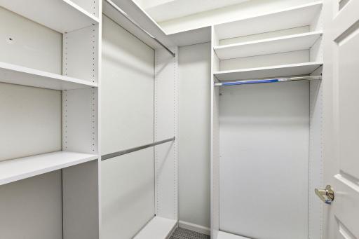 The custom built in closet organizers help you optimize the space in your walk-in closet