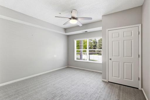 Featuring the bedroom upgraded Carpeting & custom wooden blinds