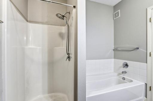 A sperate tub and walk in shower.