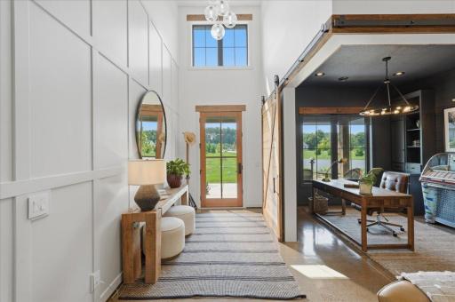 Welcome in! Two story foyer with ample natural light.