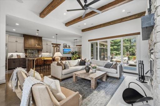Warm and welcoming open-concept living, kitchen, and dining area.
