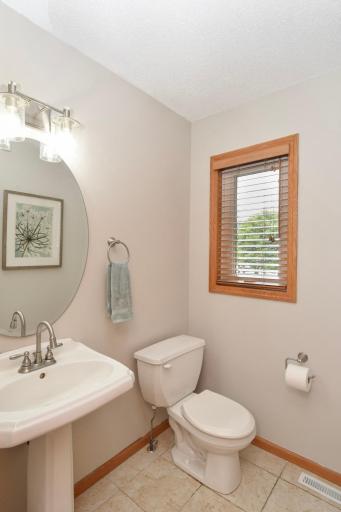 Convenient Yet Discreetly Located Powder/Guest Bath on Main Level!