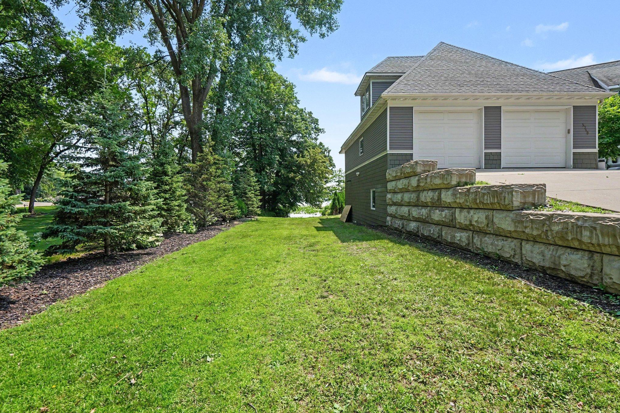 This is the deeded access space which is three homes past the subject property in the culdesac on the right. You can bring your canoe, paddle boat or fishing poles here. Private/deeded access to the lake off Schmidt Lake Rd/Larch Lane & 54th Ave N.