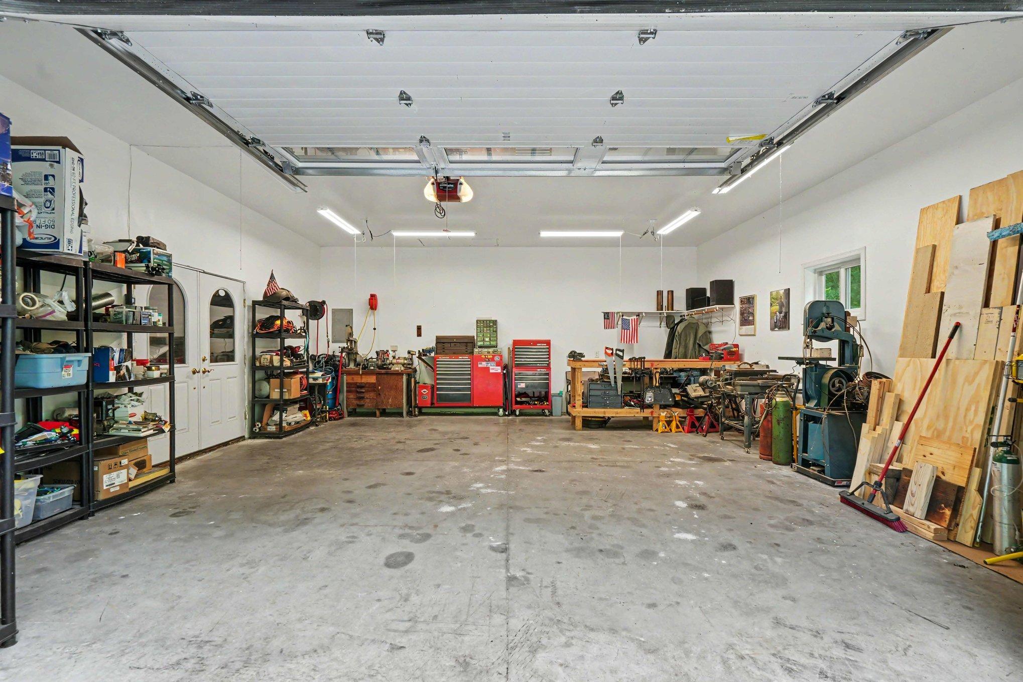 2 car garage addition separated by a double door to keep the woodworking and sanding on this side of the garage.