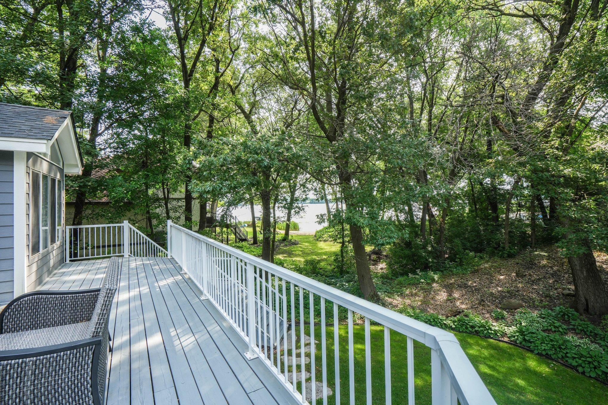 Maintenance free railings and a stairway to the back yard