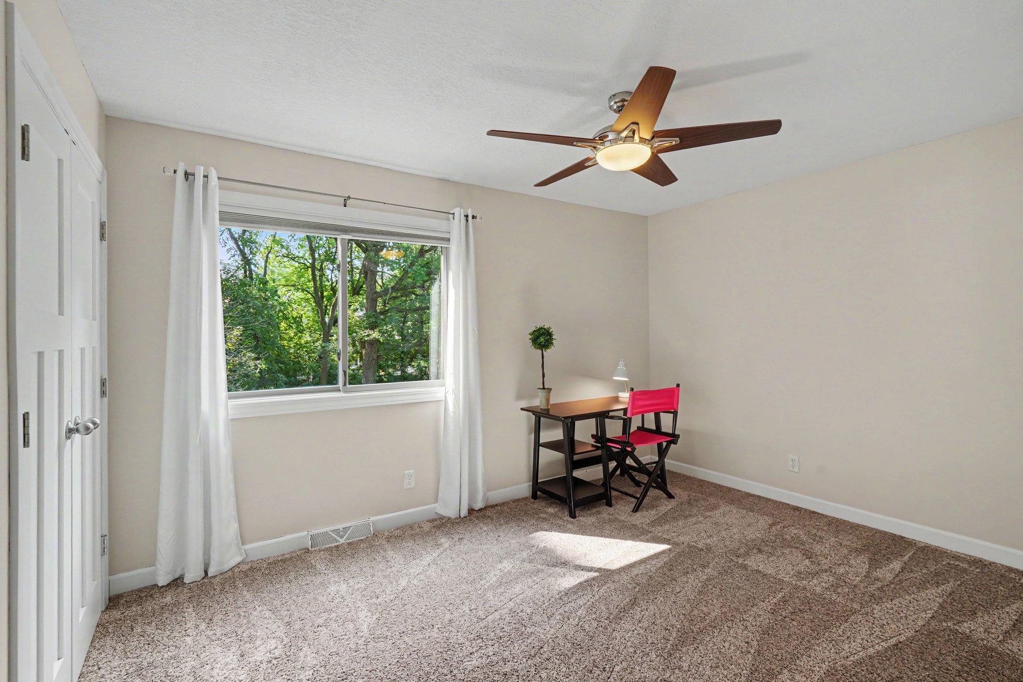 The 3rd bedroom is being used as an office