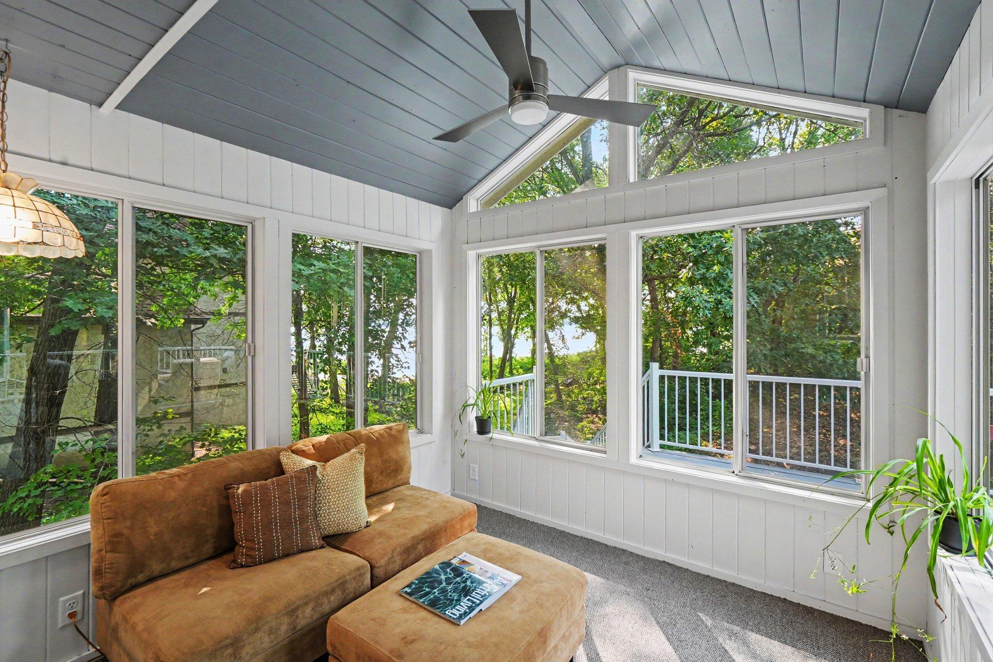 The 3 season Sunroom has excellent views of Bass Lake and is a great place to spend evenings without the bugs.