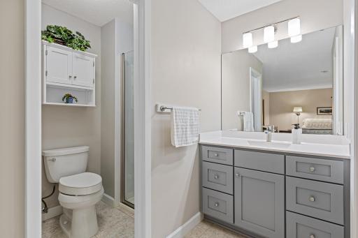 Fresh finishes and a sleek vanity make this bathroom feel like a polished retreat, just steps from the primary bedroom.