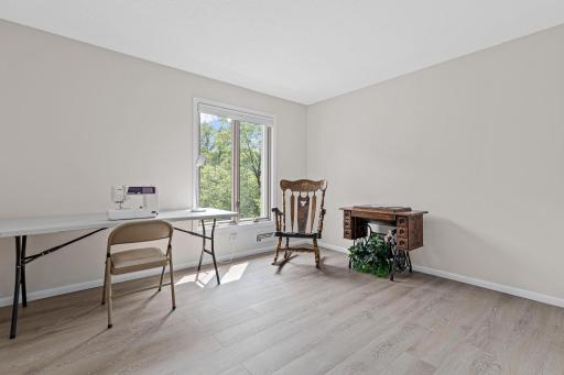 Bathed in natural light, this flexible upper-level room is ready to become a bedroom, craft room or office.