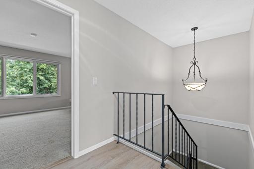 The hallway sky tube makes the upstairs bright and airy.