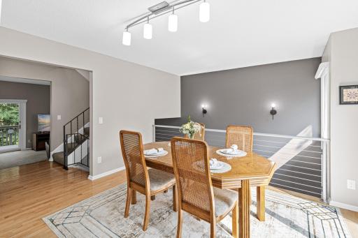 Positioned just off the deck, this sunlit dining area is made for slow mornings and easy evening meals with a view.