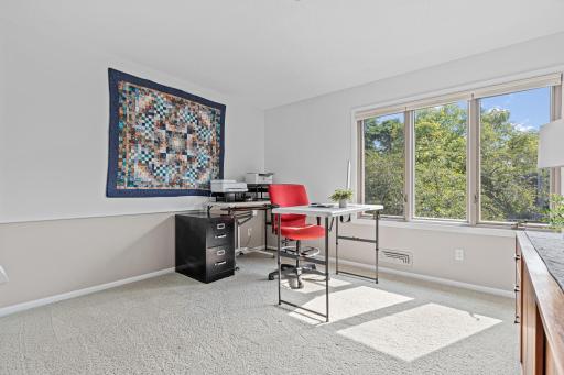 Big windows and the large space make this room ideal for remote work, hobbies, or a peaceful guest space.