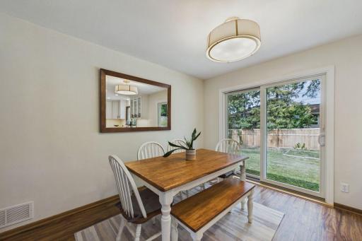 The seller had this patio door installed to allow more light in and to create direct access to backyard from the dining room.
