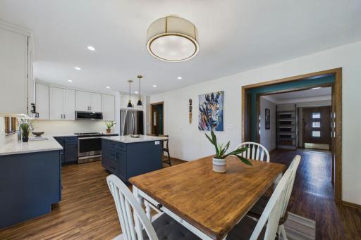 The kitchen and dining room were previously separated by a wall.