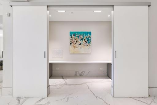 Office off of the kitchen and living room spaces