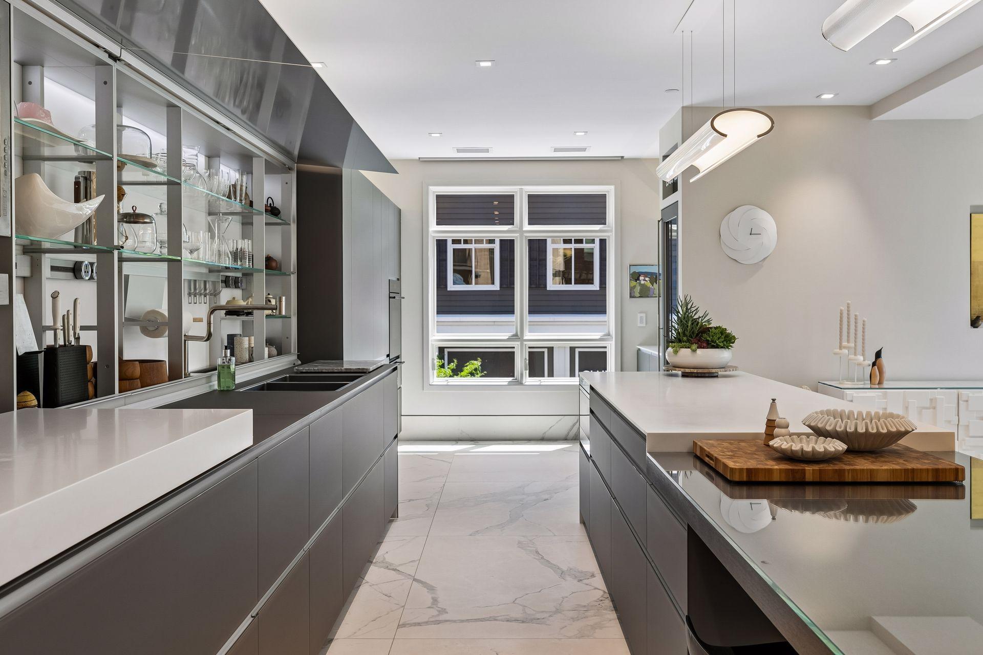 Stylish faucet can be pushed back and hidden behind the cabinets