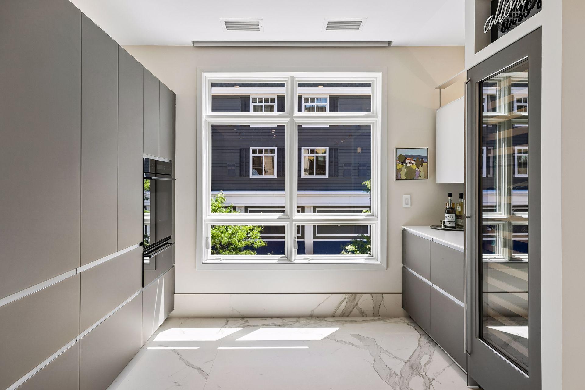 Sleek appliances and storage throughout