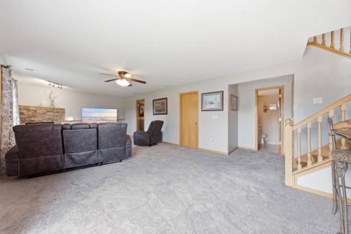Another view of the family room, on this side of the home you see the 4th bedroom, laundry and bath.