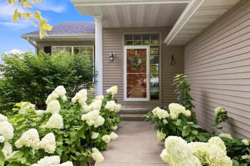 Beauiful hydrangea plants offer a welcoming front entry!