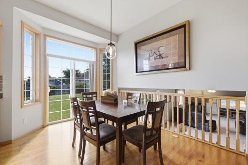 Open dining room keeps everyone connected.