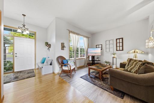 Living room is on the main level and is the perfect place to entertain or relax and watch the activity in the cul-de-sac.