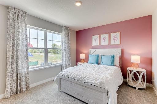 Another gorgeous secondary bedroom. Photo of model home, colors and finishes will vary.