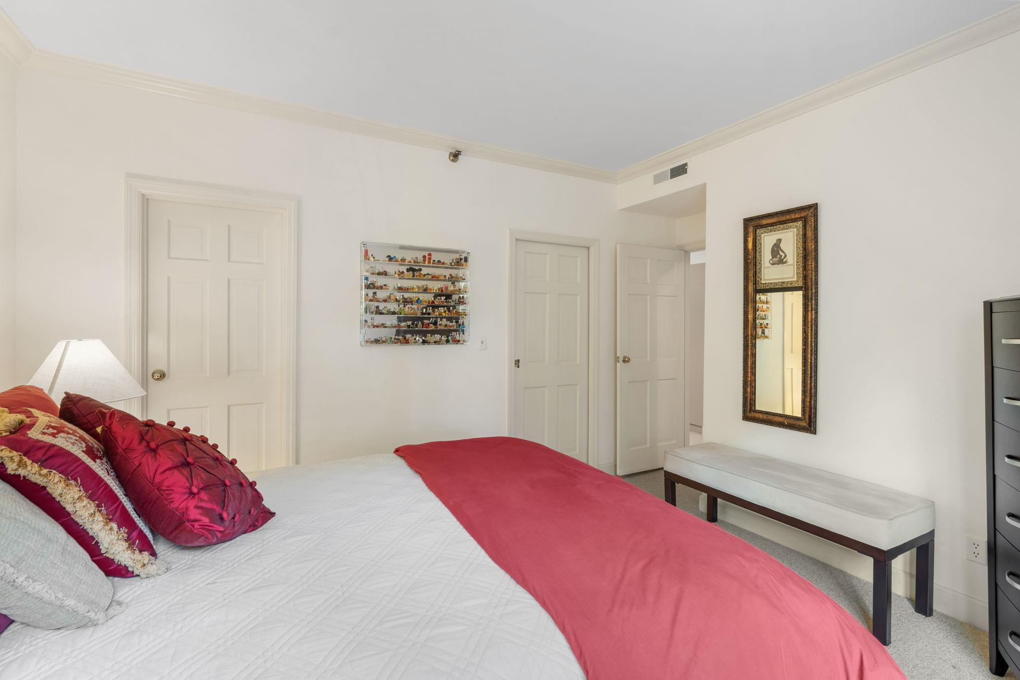This room has pocket doors leading to the secondary full bathroom