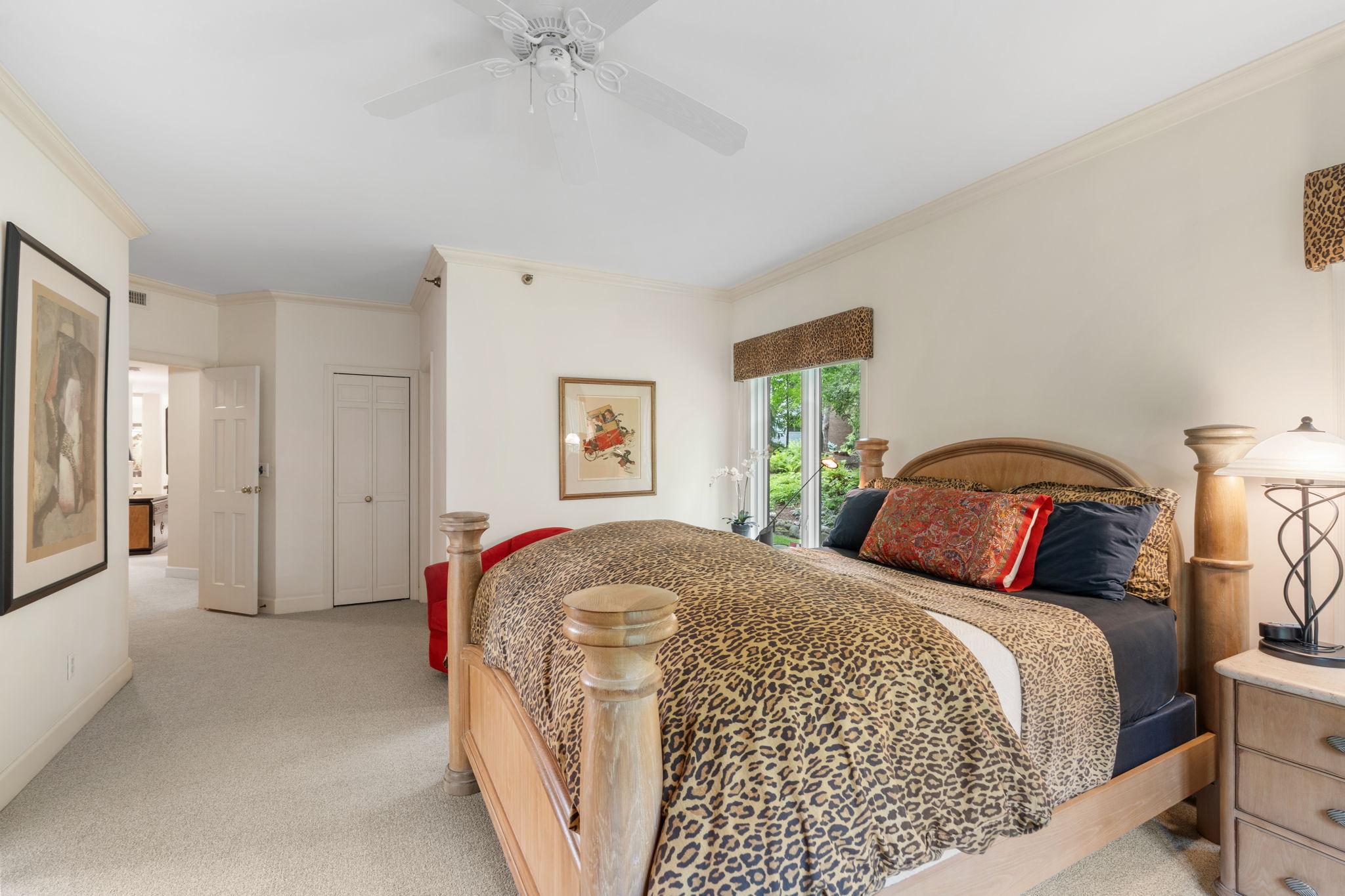 This bedroom features two walk-in closets