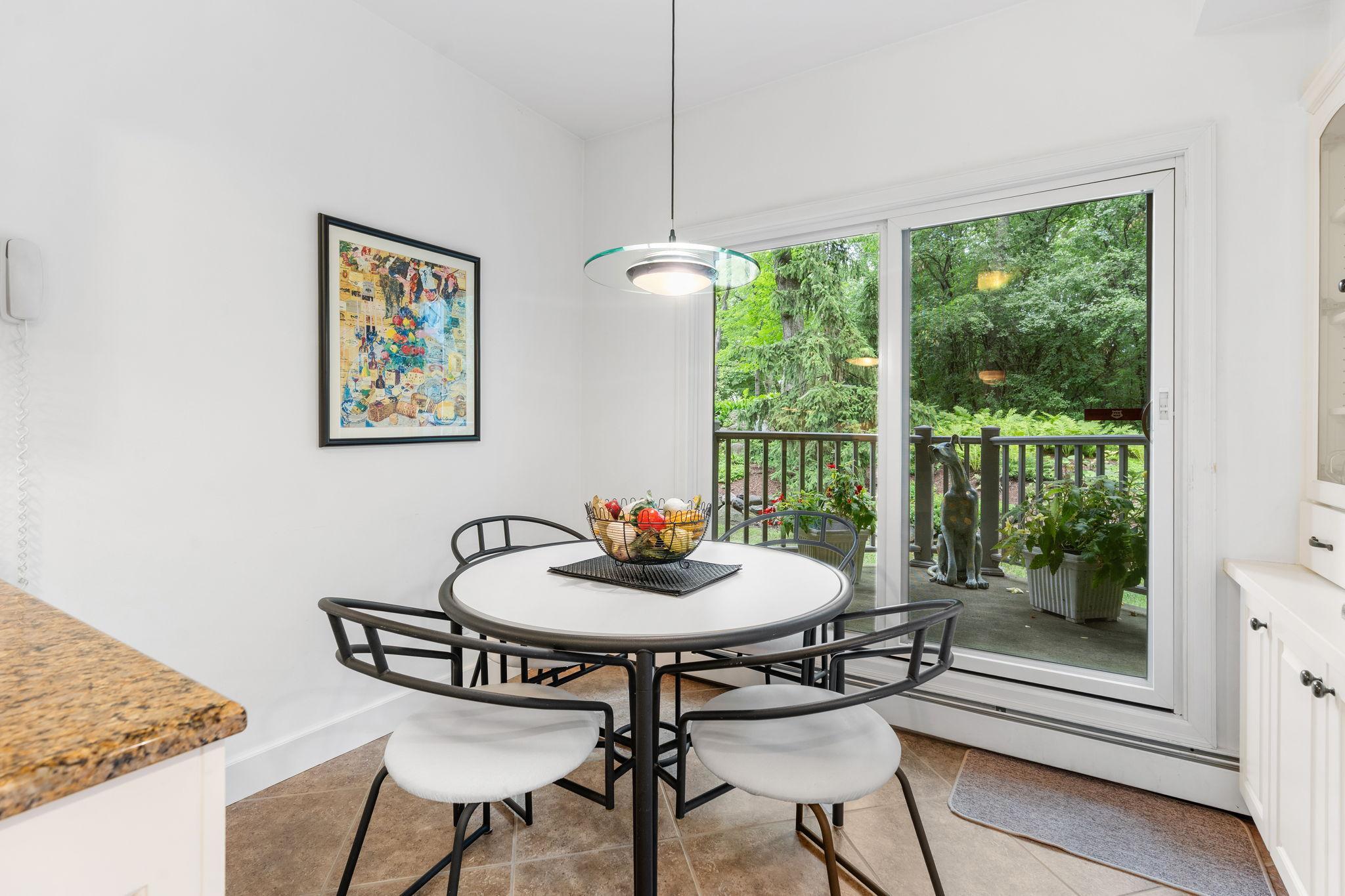 Casual eat-in kitchen space leading to the patio