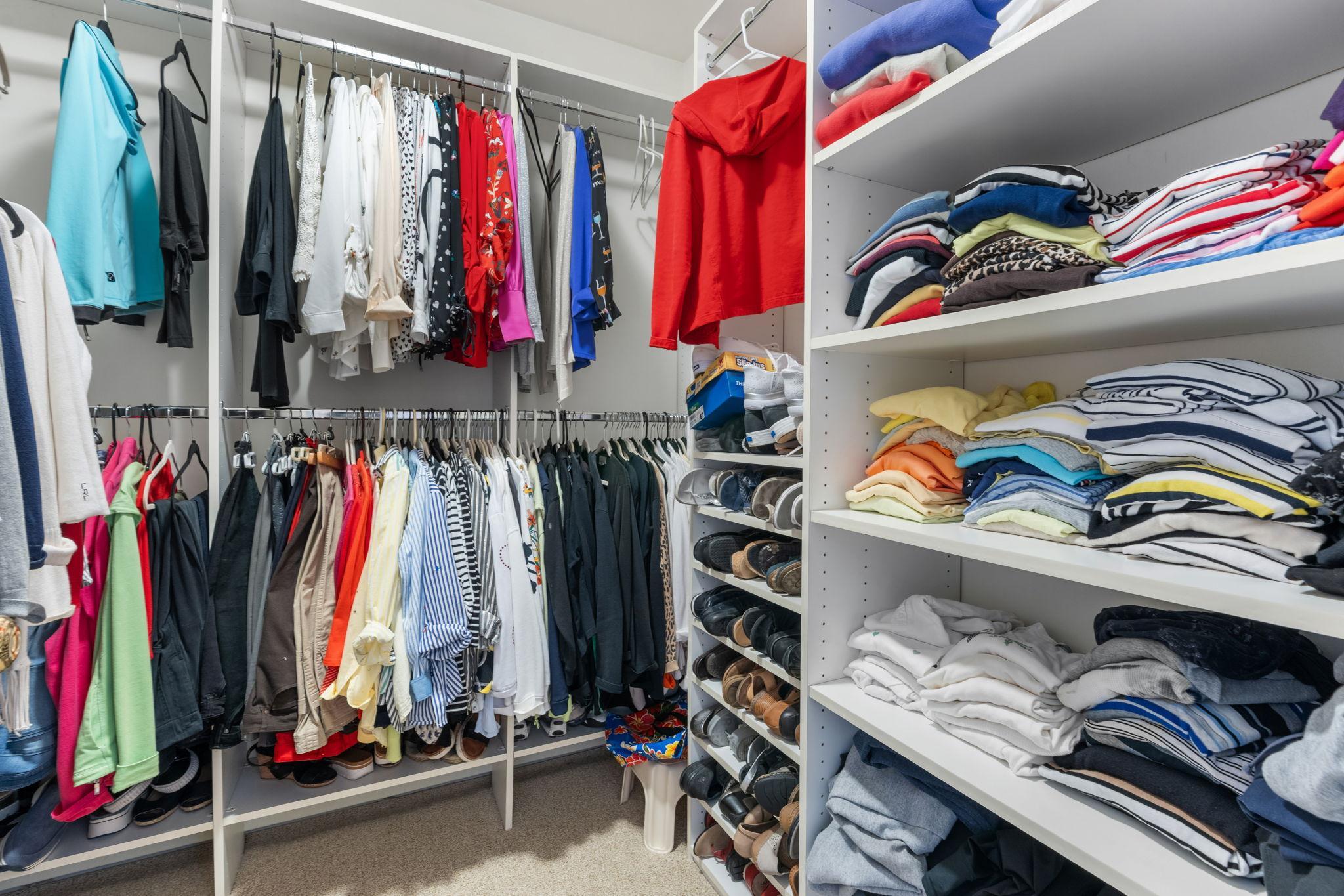 One of two walk-in closets in the primary bedroom