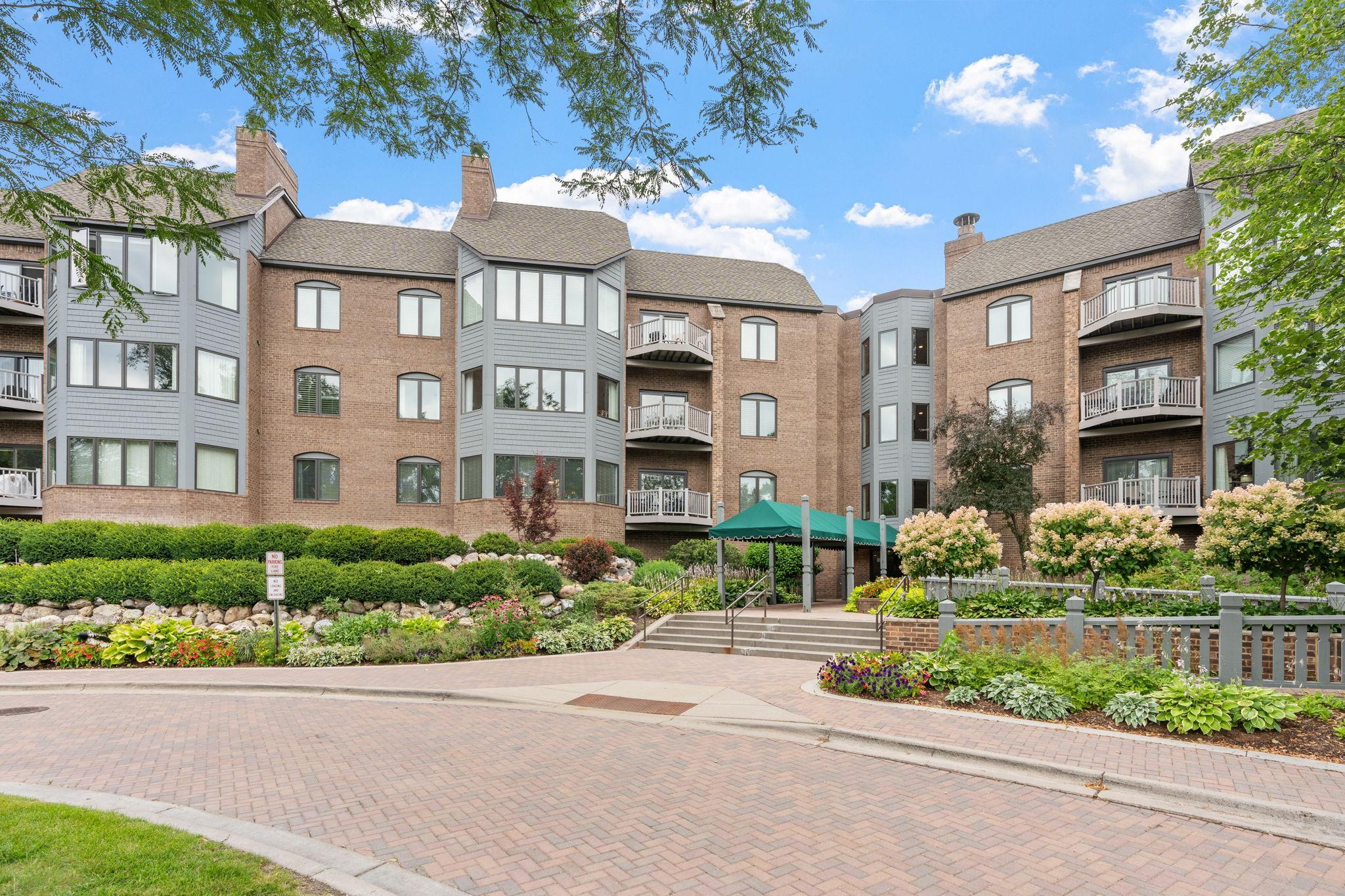 First impressions are everything! This immaculately maintained property features meticulously cared for landscaping and stately paver driveways and sidewalks.