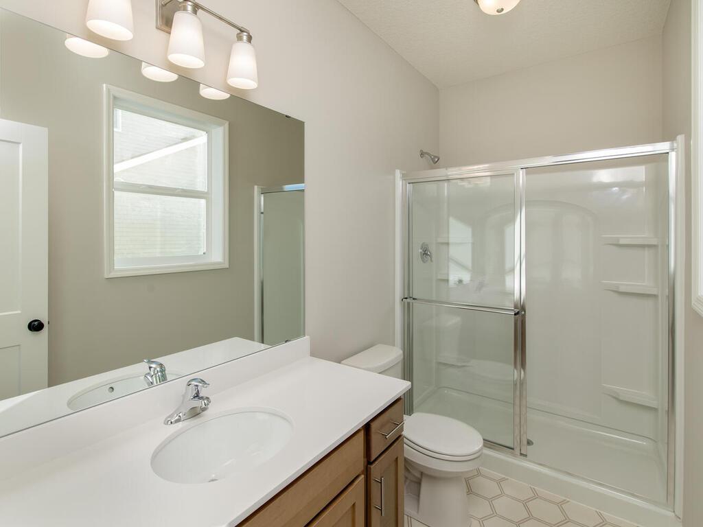 3/4 main floor bathroom located inside the 5th bedroom