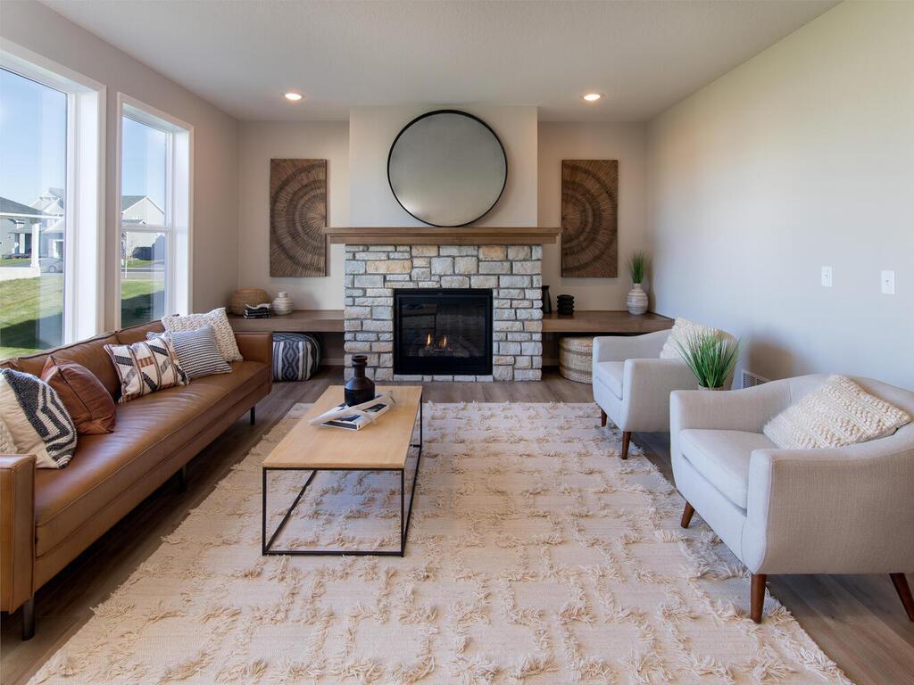 Photo of a similar home. Gas fireplace with optional built in bench