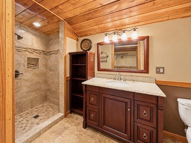 Upper bathroom with tiled walk in shower