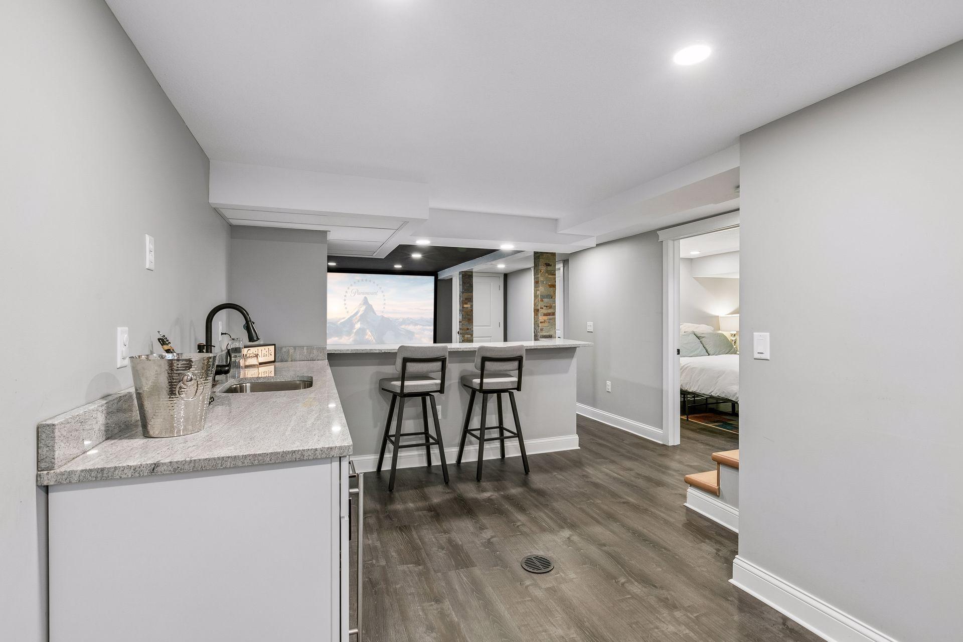 Kitchenette w/sink, refrigerator, granite