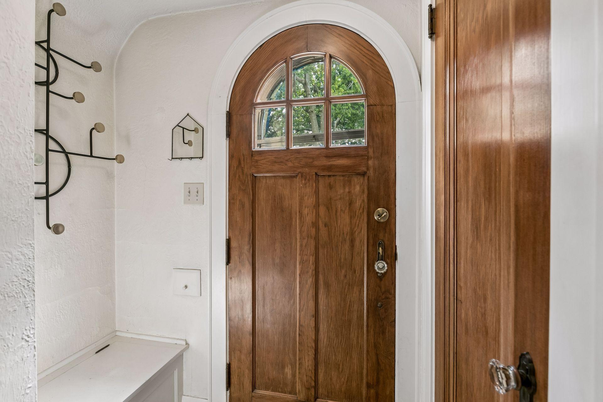 Front foyer with closet and bench